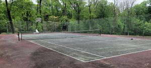 water-damaged-tennis-court-Deshayes-Dream-Courts