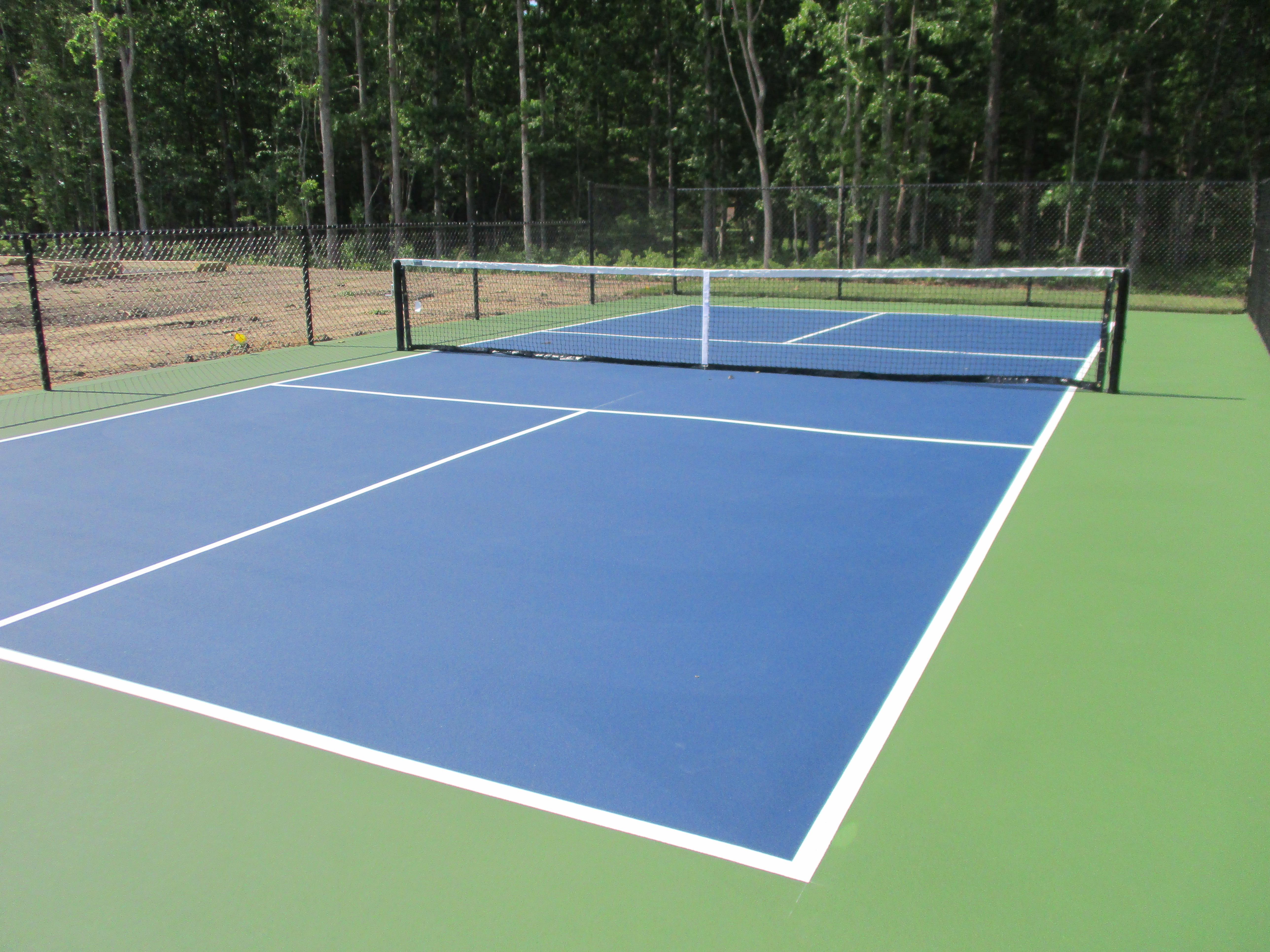 custom-pickleball-court-serving_view-DeShayes-Dream-Courts